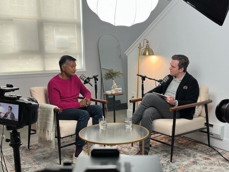 Tyler recording a podcast with the former General Counsel of Adobe